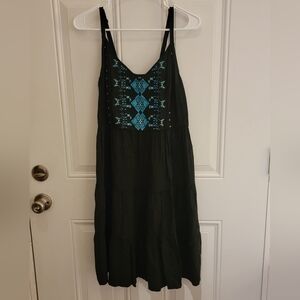 Torrid knee length black dress with teal Tribal Design, size 0